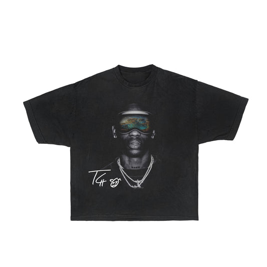 Image: A black graphic tee showcasing a captivating design inspired by Travis Scott.